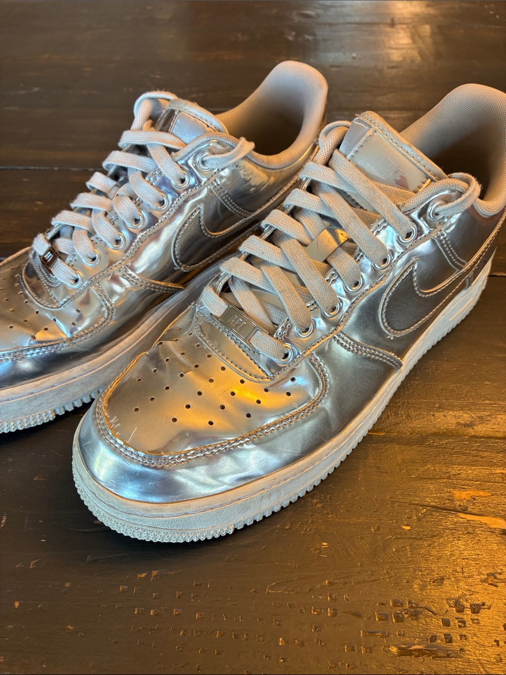 Nike Women's Air Force one Sneakers in Metallic Silver